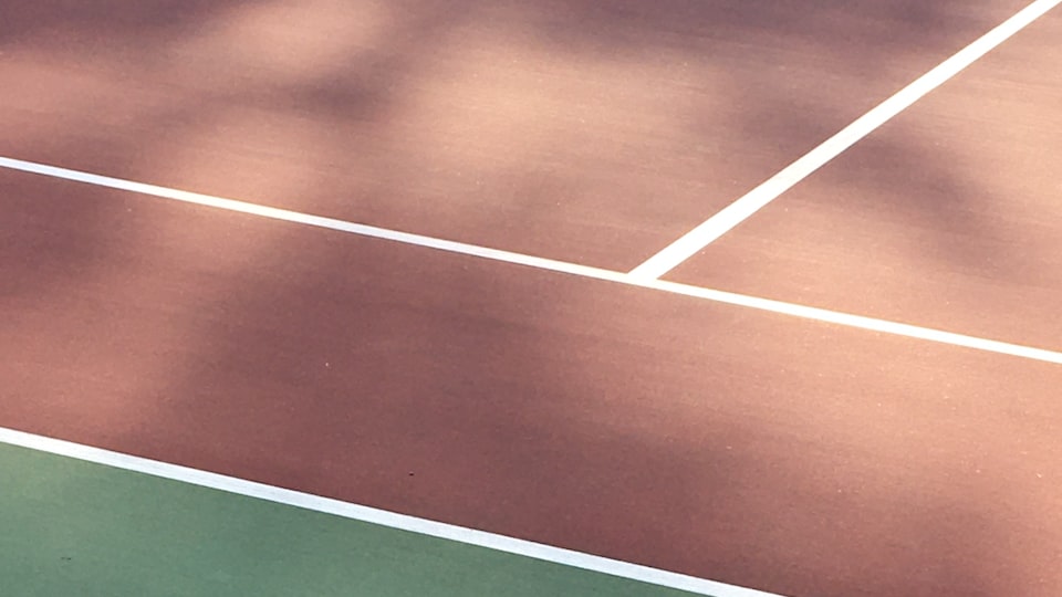 Bild von einer Person beim Tennis-Konditionstraining